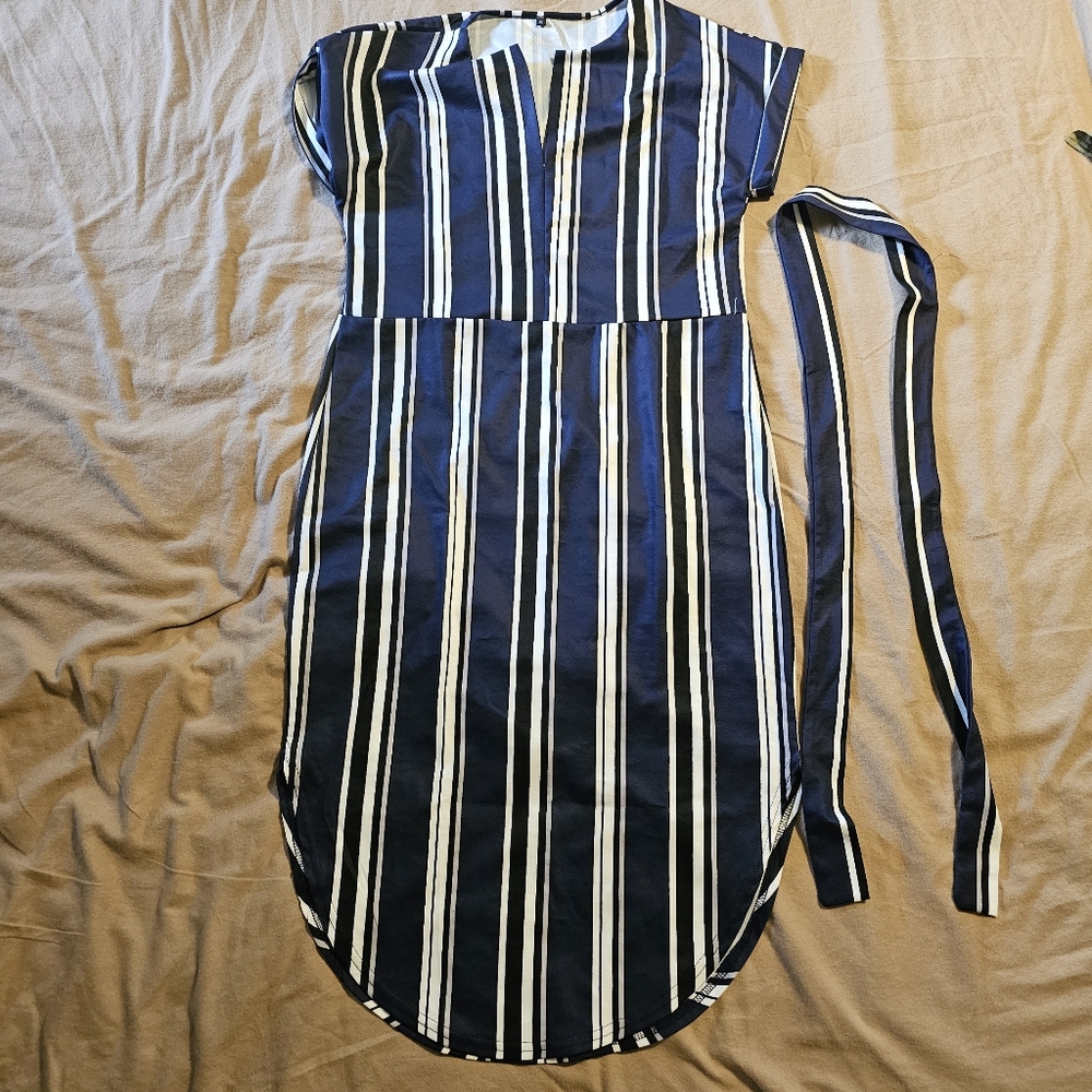 Blue white stripe dress unknown who made it but it was put on once and taken off